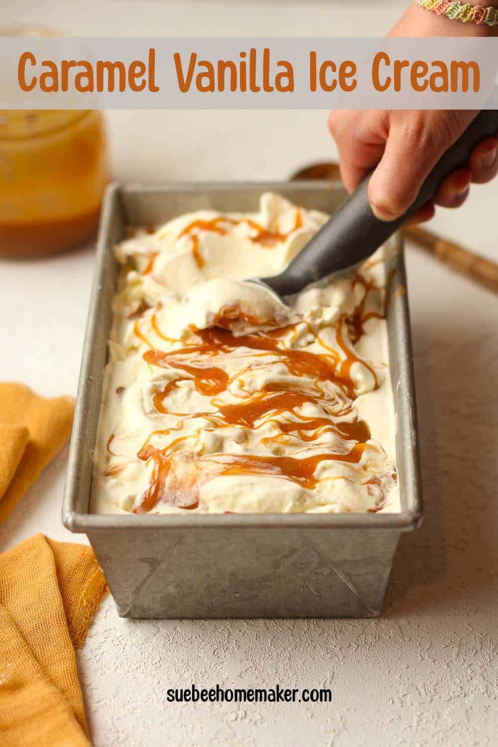 Side view of a pan of caramel vanilla ice cream.