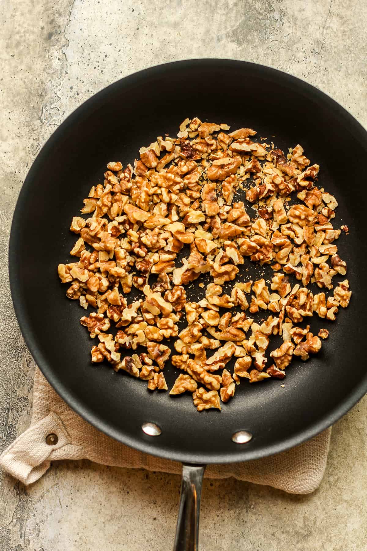 A pan of toasted walnuts.