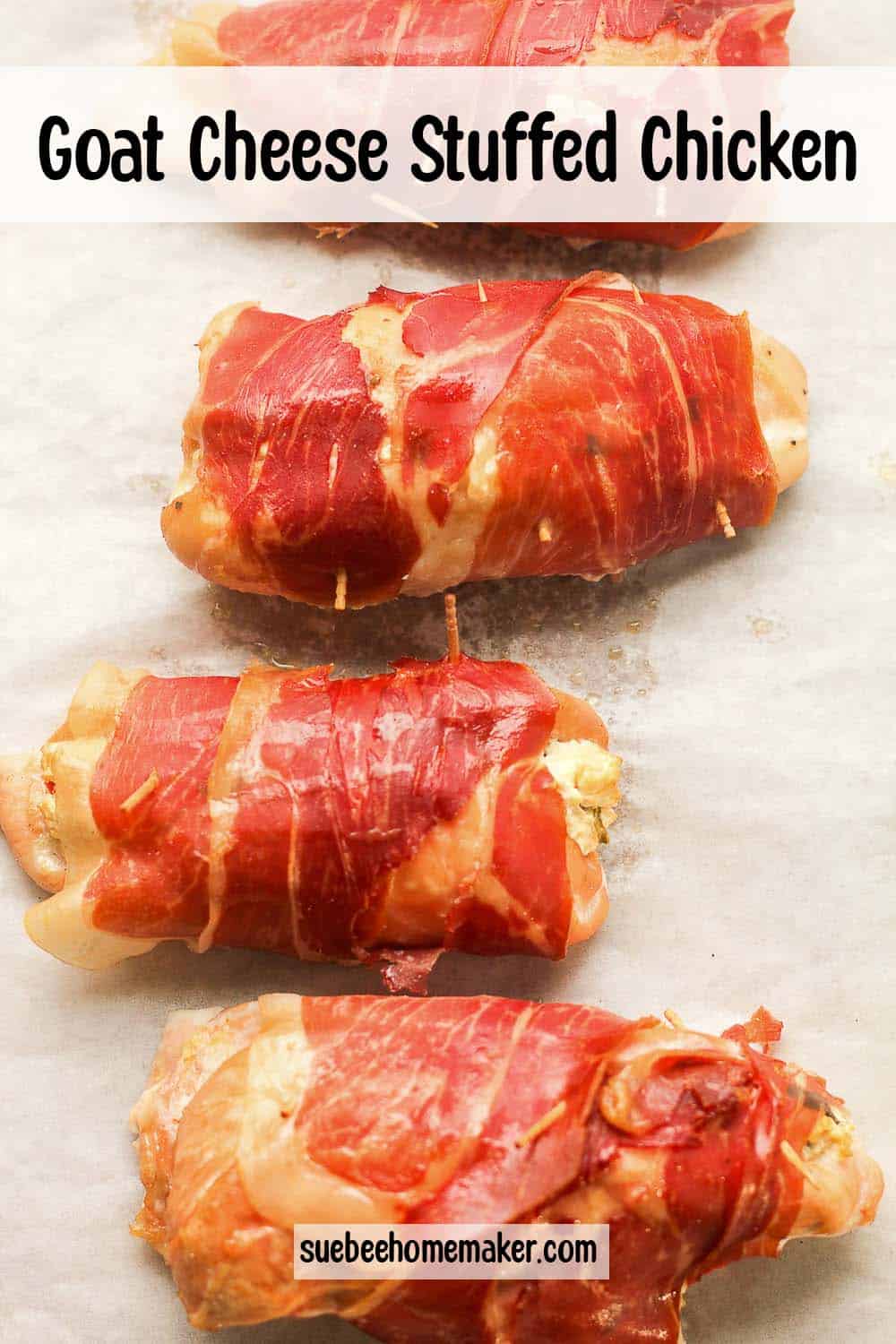 A tray of goat cheese stuffed chicken wrapped in parma ham.