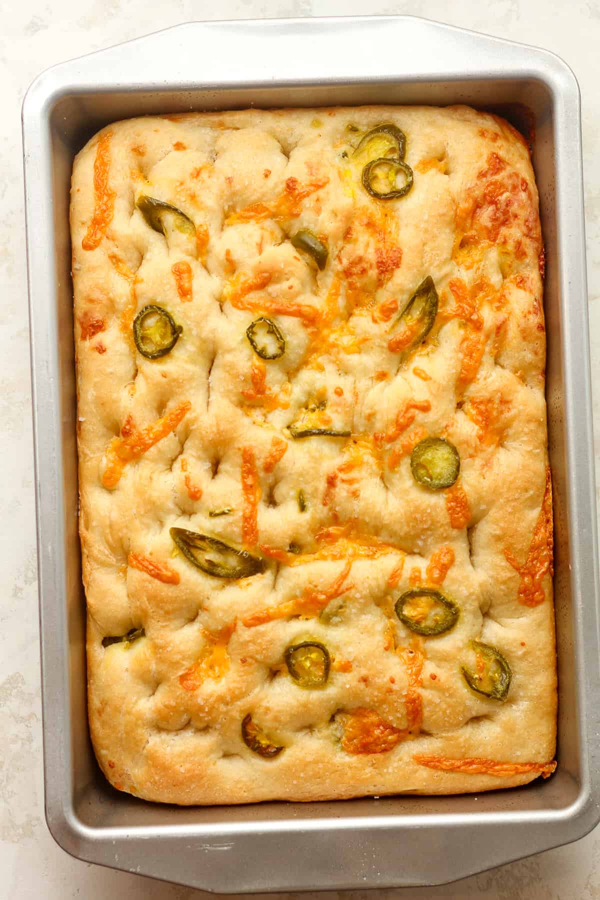 A pan of just baked focaccia.