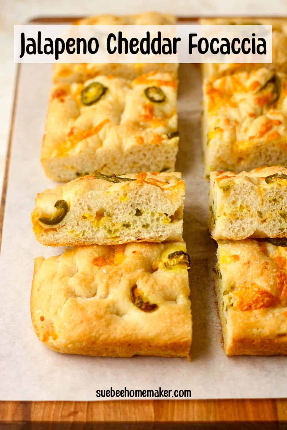 A board with squares of jalapeno cheddar focaccia.