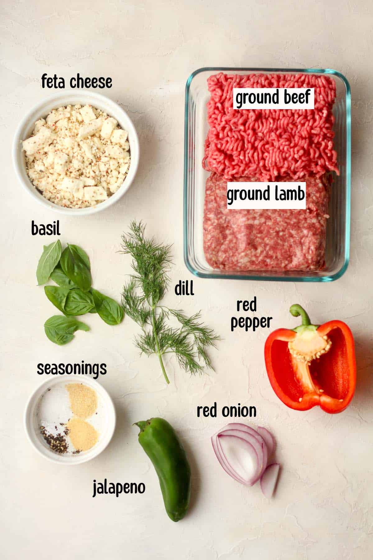The labeled ingredients for the lamb feta burgers.