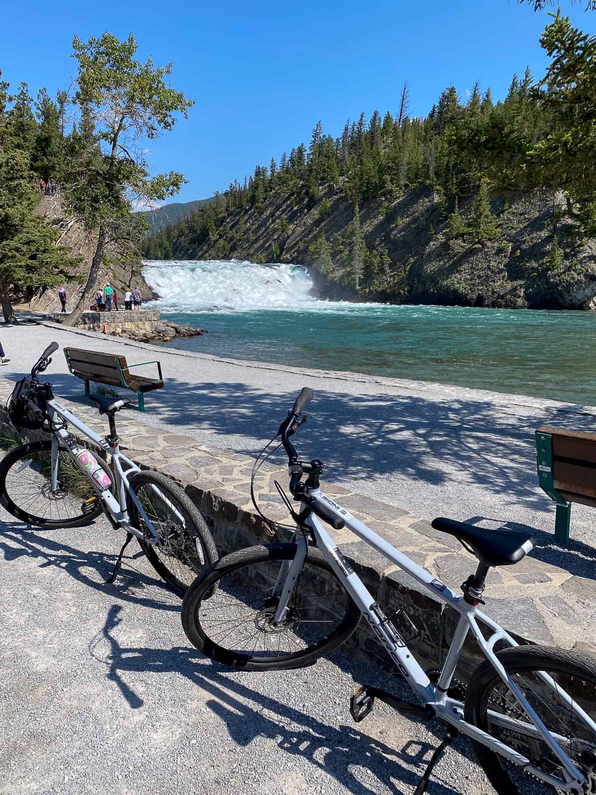 Our bikes parked beside the Bow River.