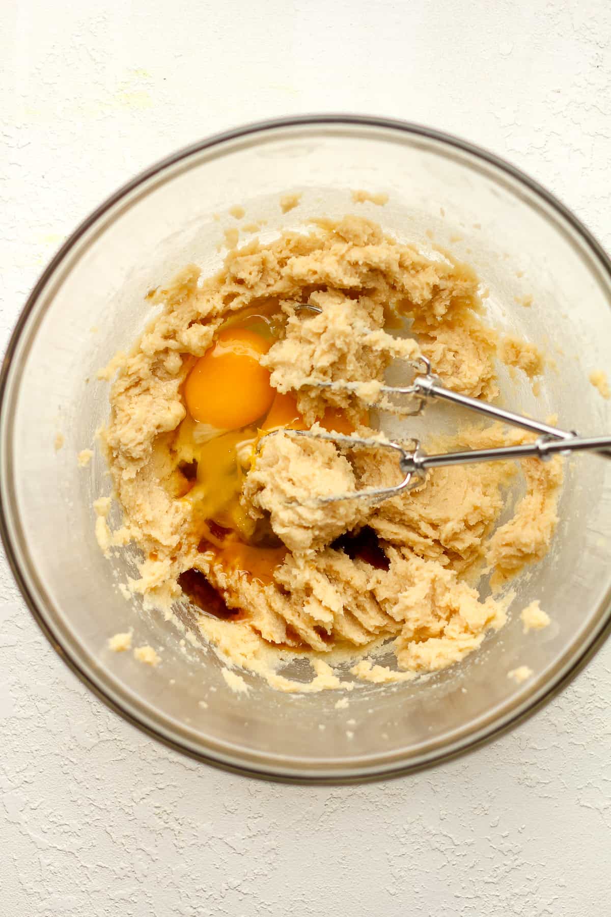 A bowl of wet ingredients for the cookie dough.