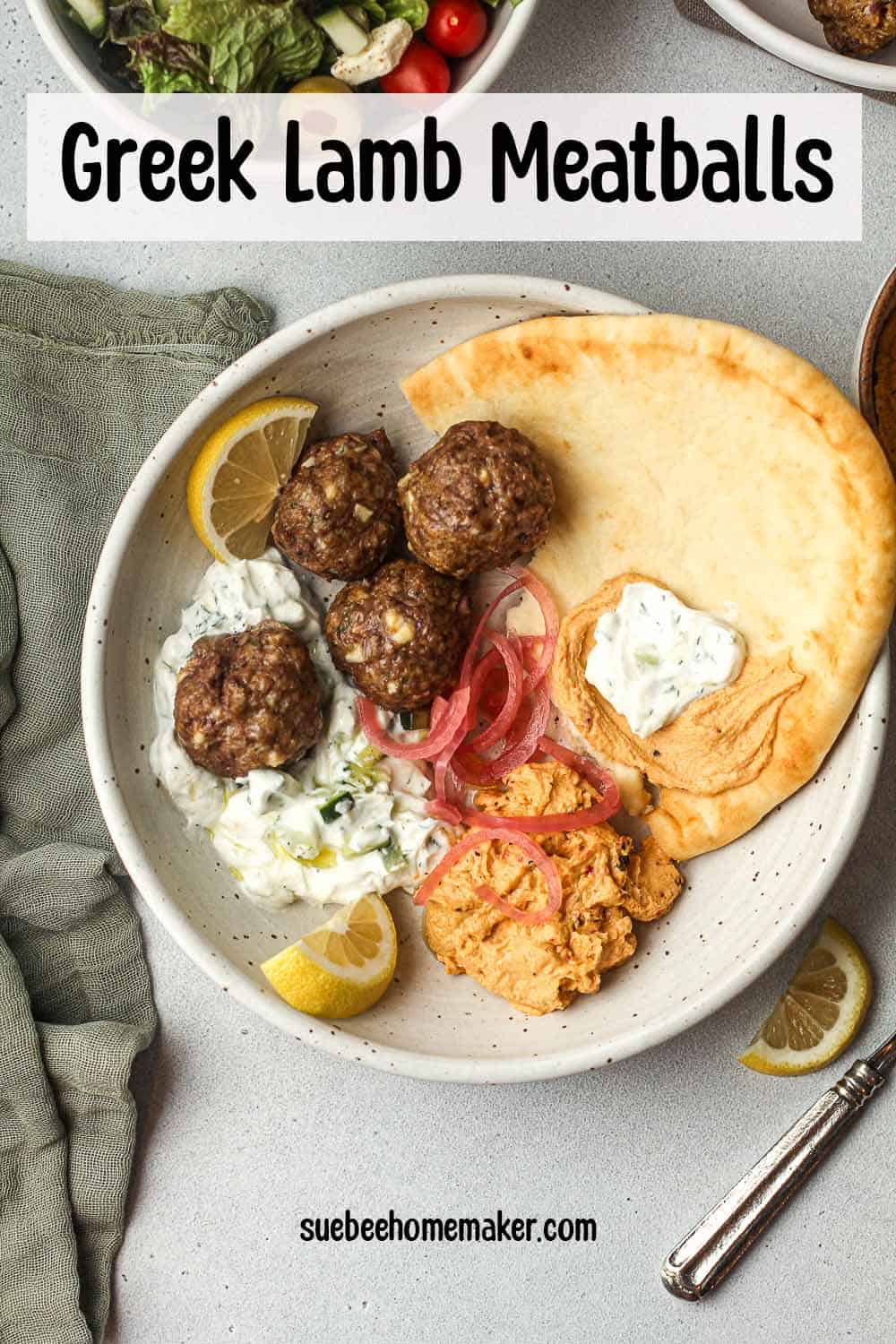A Greek bowl with lamb meatballs, naan, and tzatziki.