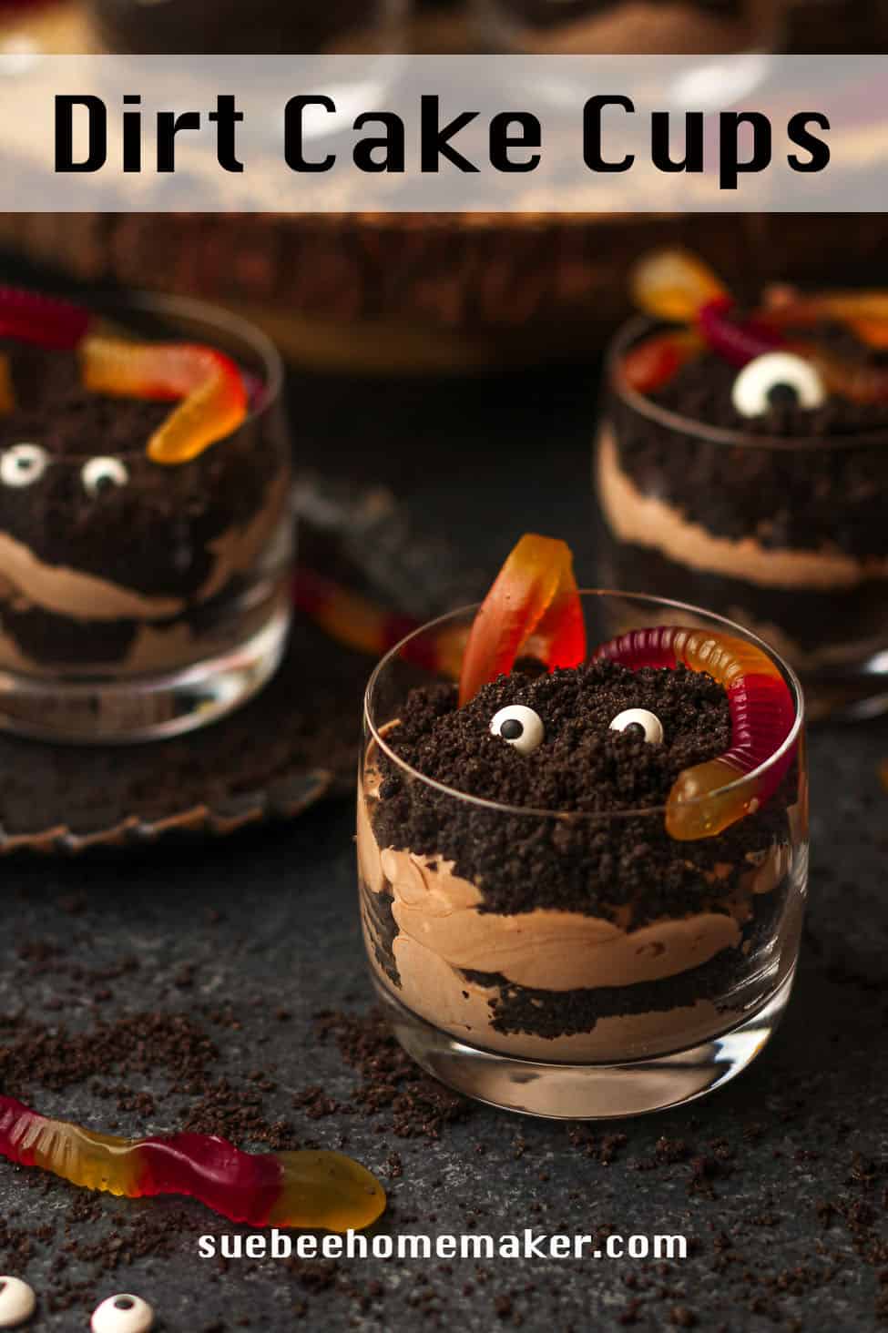 Side view of several glasses of dirt cake cups.