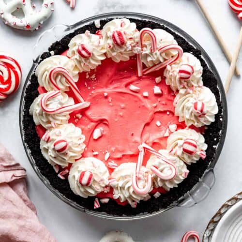 A candy cane peppermint pie with candy canes.