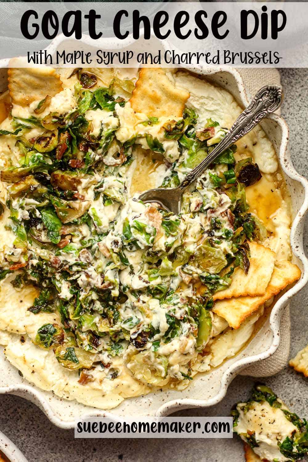 A pie pan of goat cheese dip with maple syrup and charred brussels sprouts.