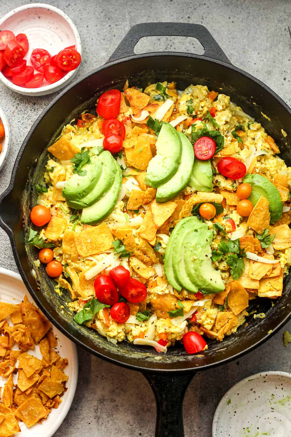 A Mexican Breakfast Skillet with avocado slices.