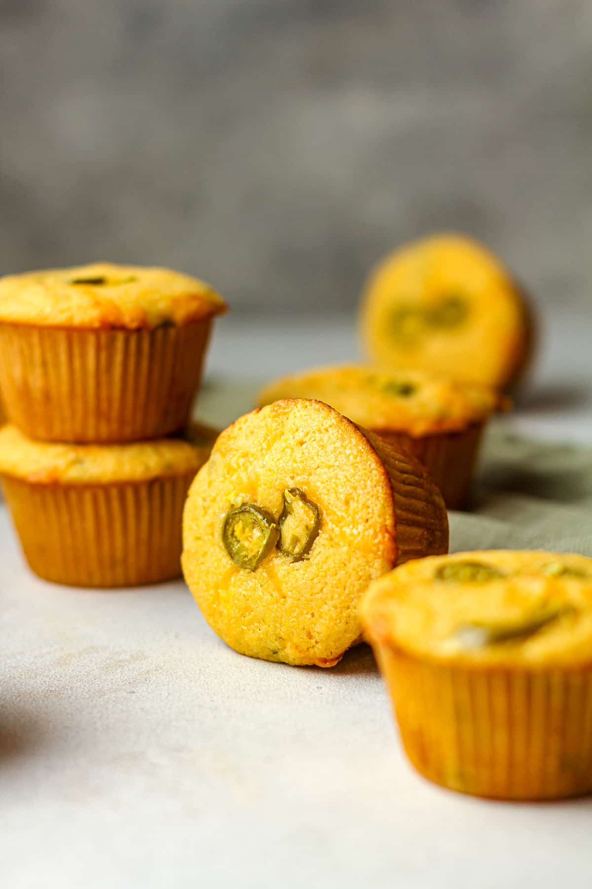 Side view of several Mexican cornbread muffins.