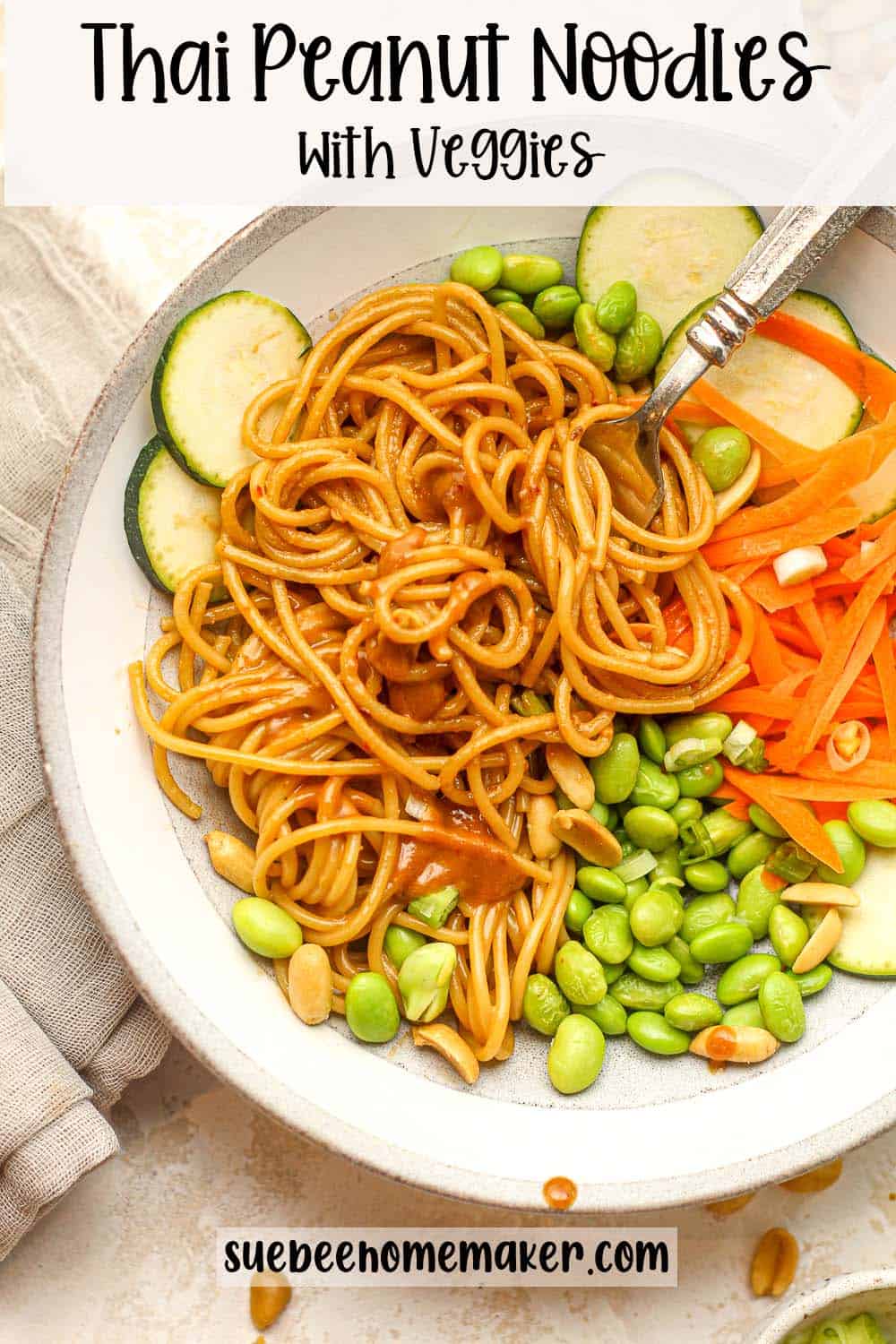 A bowl of Thai peanut noodles with veggies.