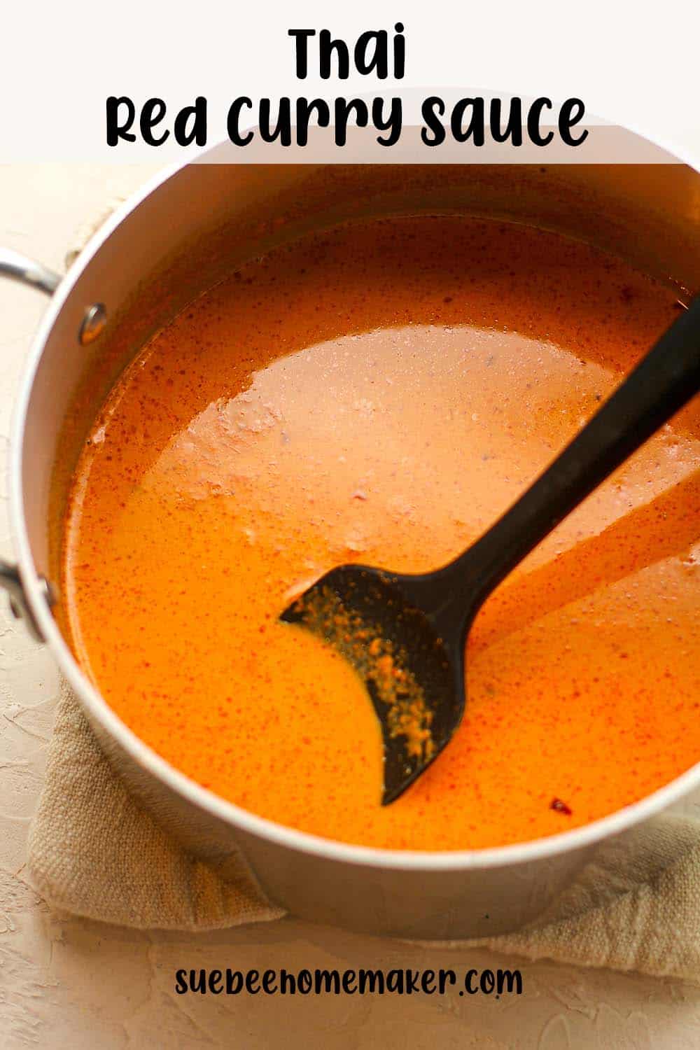 A pan of Thai red curry sauce.