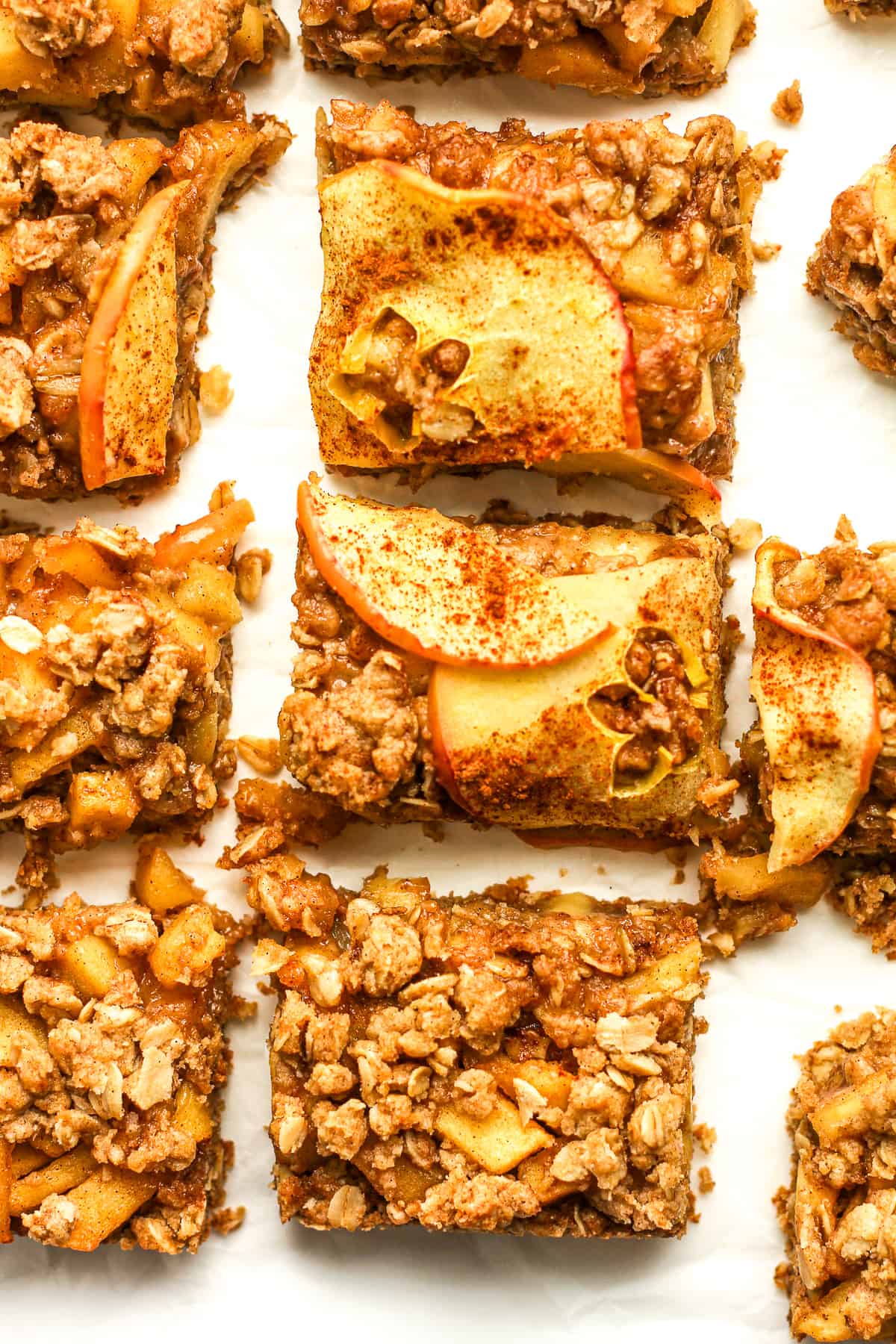 Closeup view on some squares of apple crumb bars.