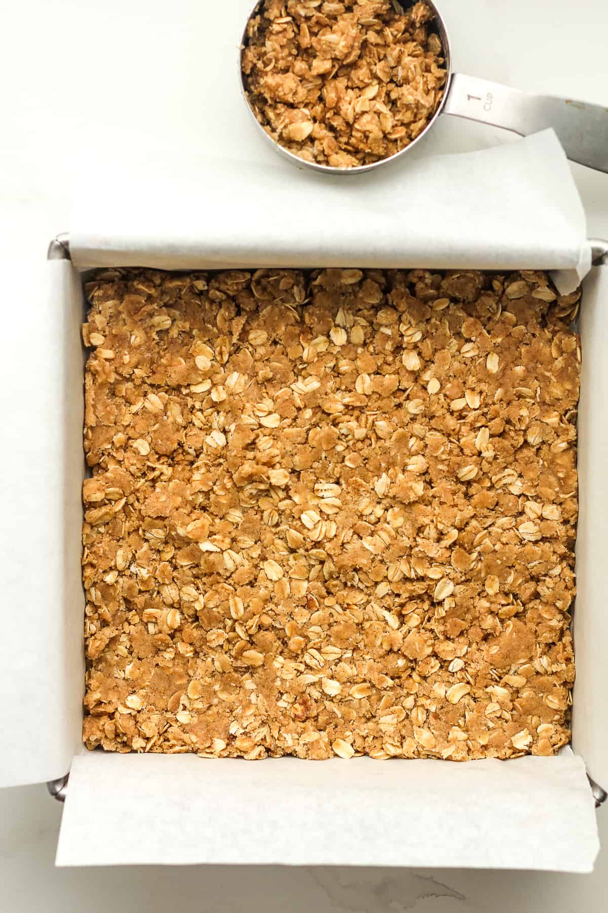 A square pan of the oatmeal mixture.