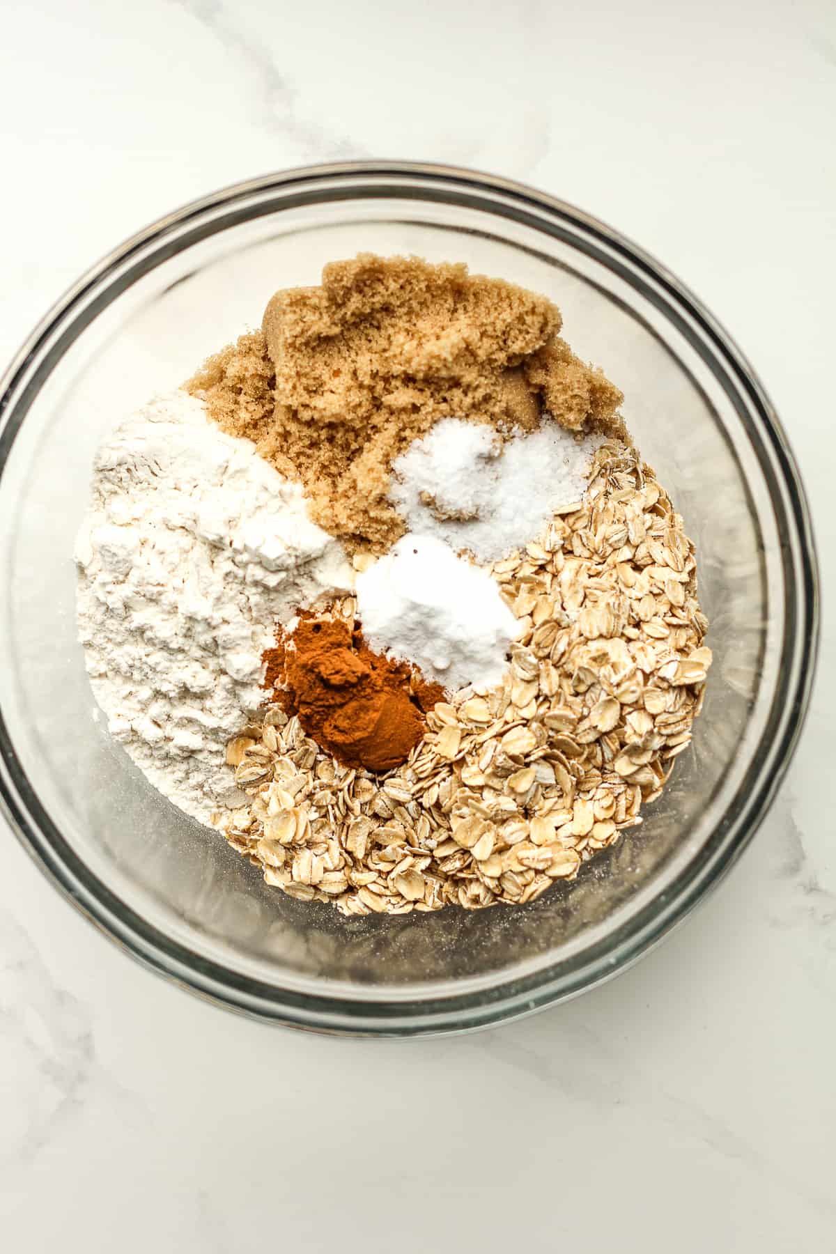 The oatmeal mixture in a glass bowl before stirring together.