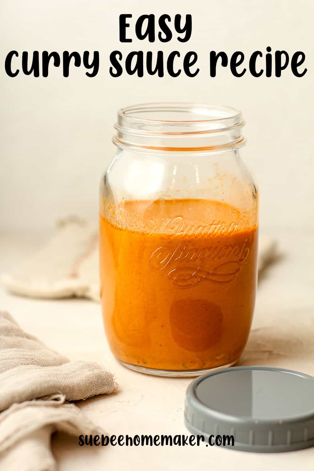 Side view of a large jar of easy curry sauce.