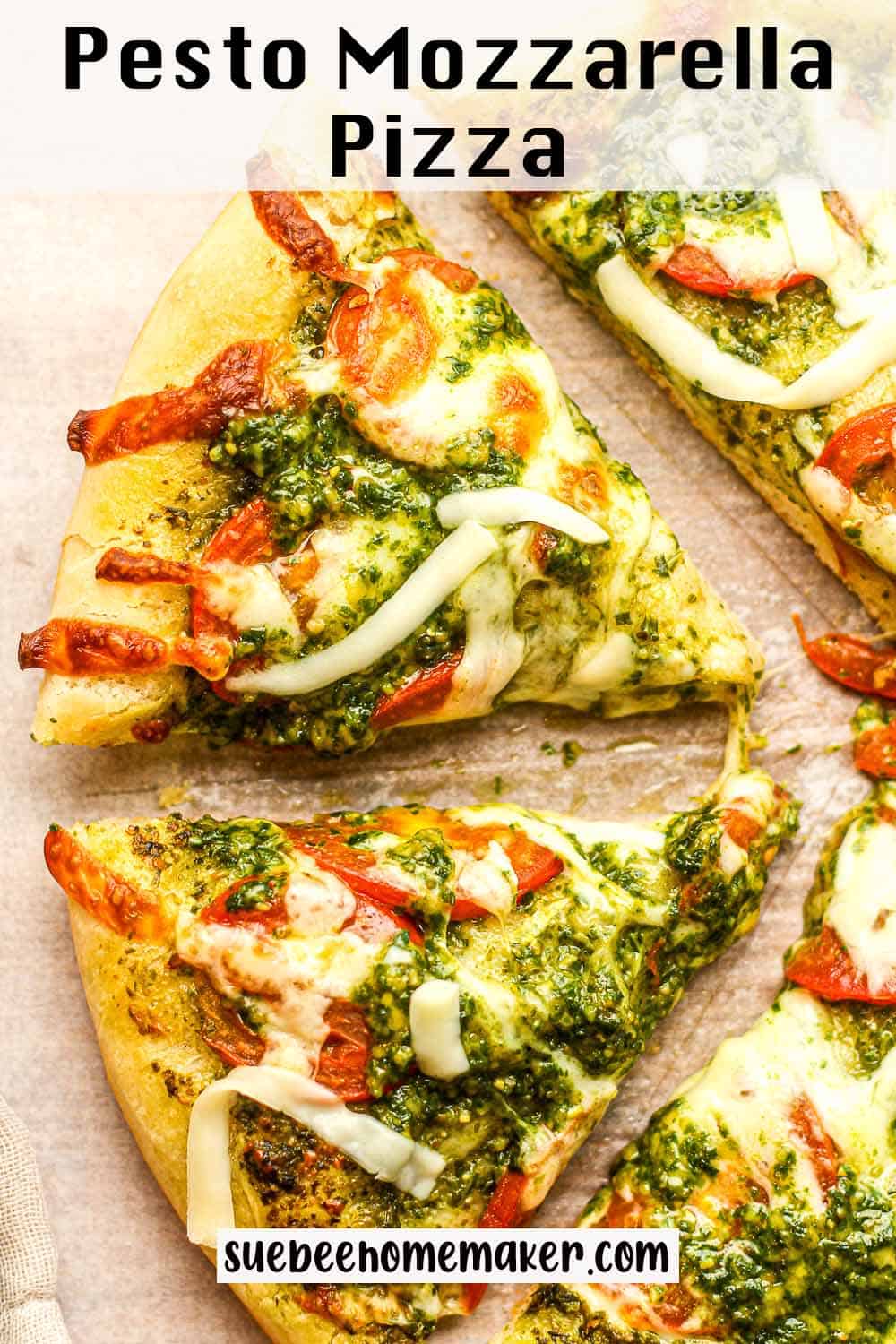 Closeup on some sliced pesto mozzarella pizza.