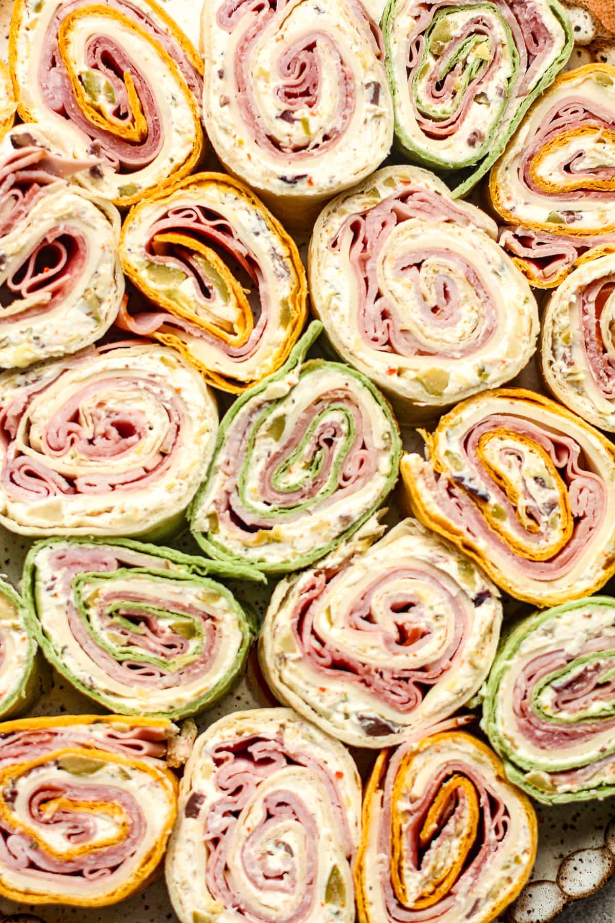 Closeup on Italian pinwheels in colorful tortillas.