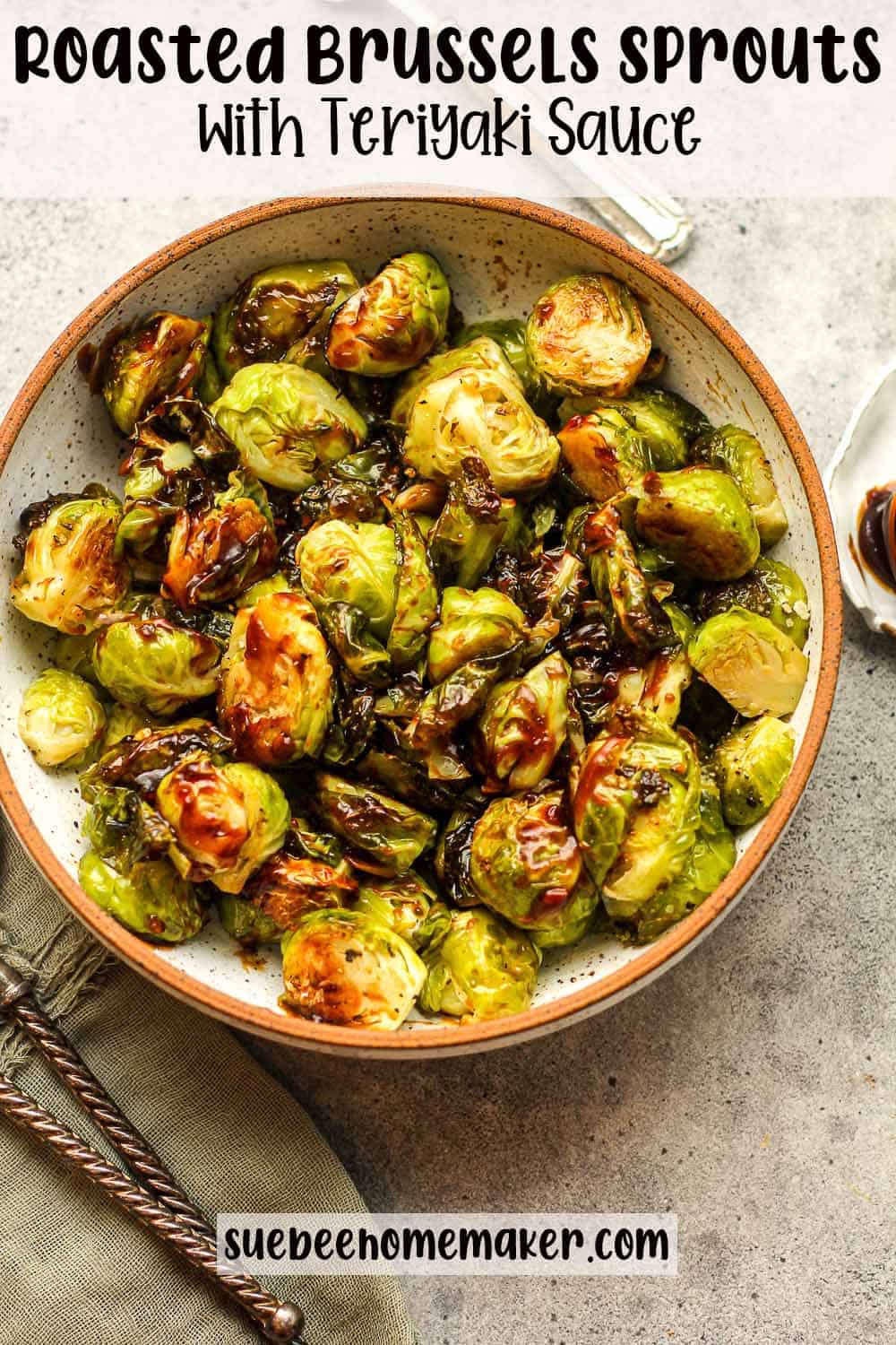 A bowl of roasted brussels sprouts with teriyaki sauce.
