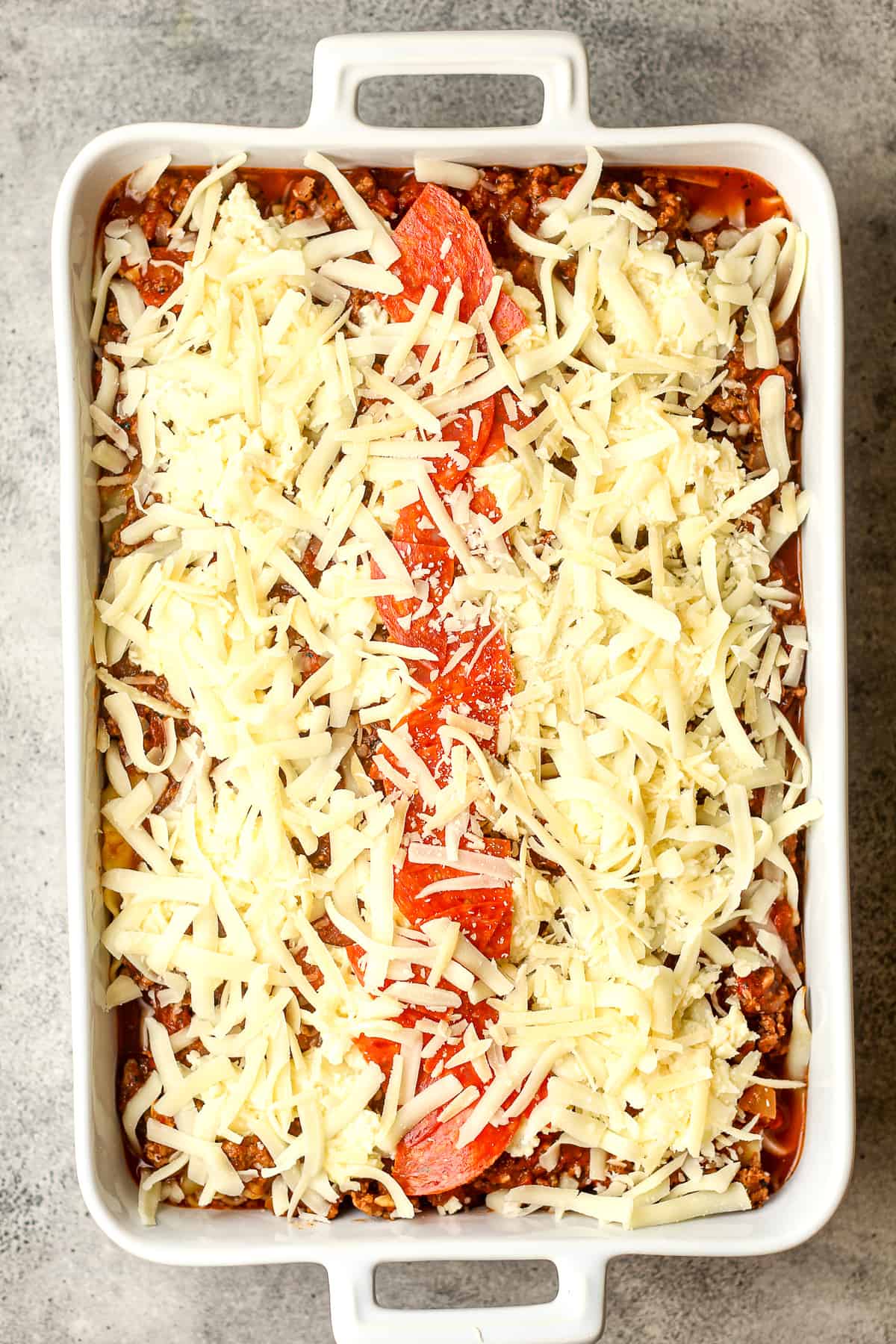 A pan of lasagna before baking.
