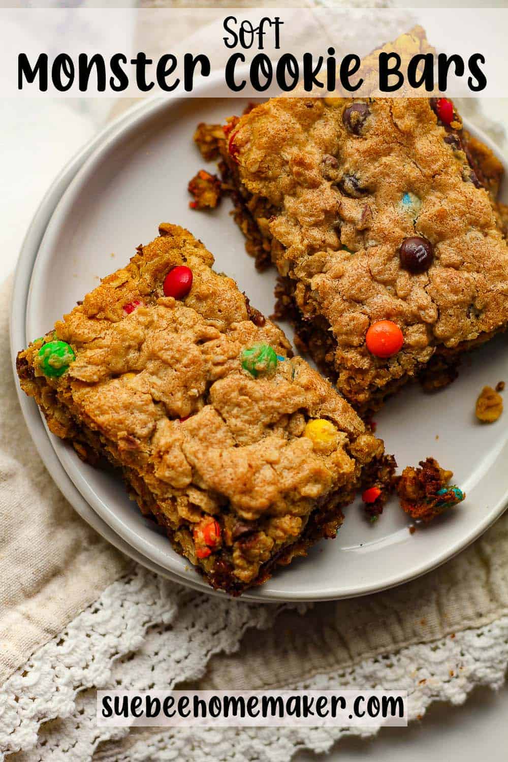 A plate of two soft monster cookie bars.