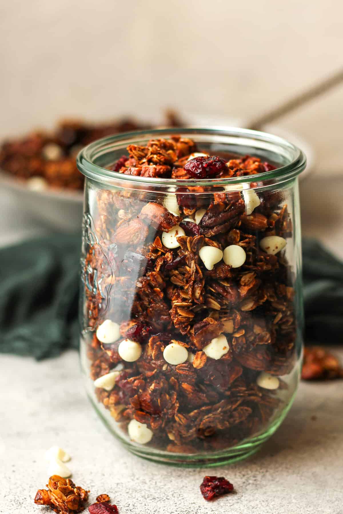 Side view of a large jar of gingerbread granola.