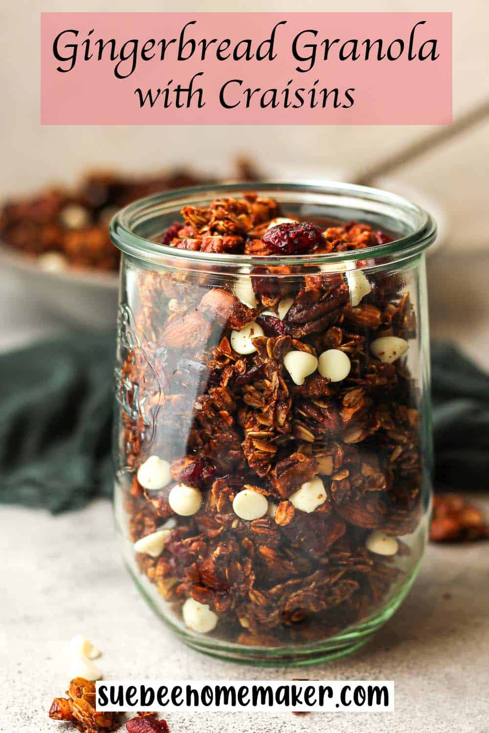 Side view of a large jar of Gingerbread granola with raisins.