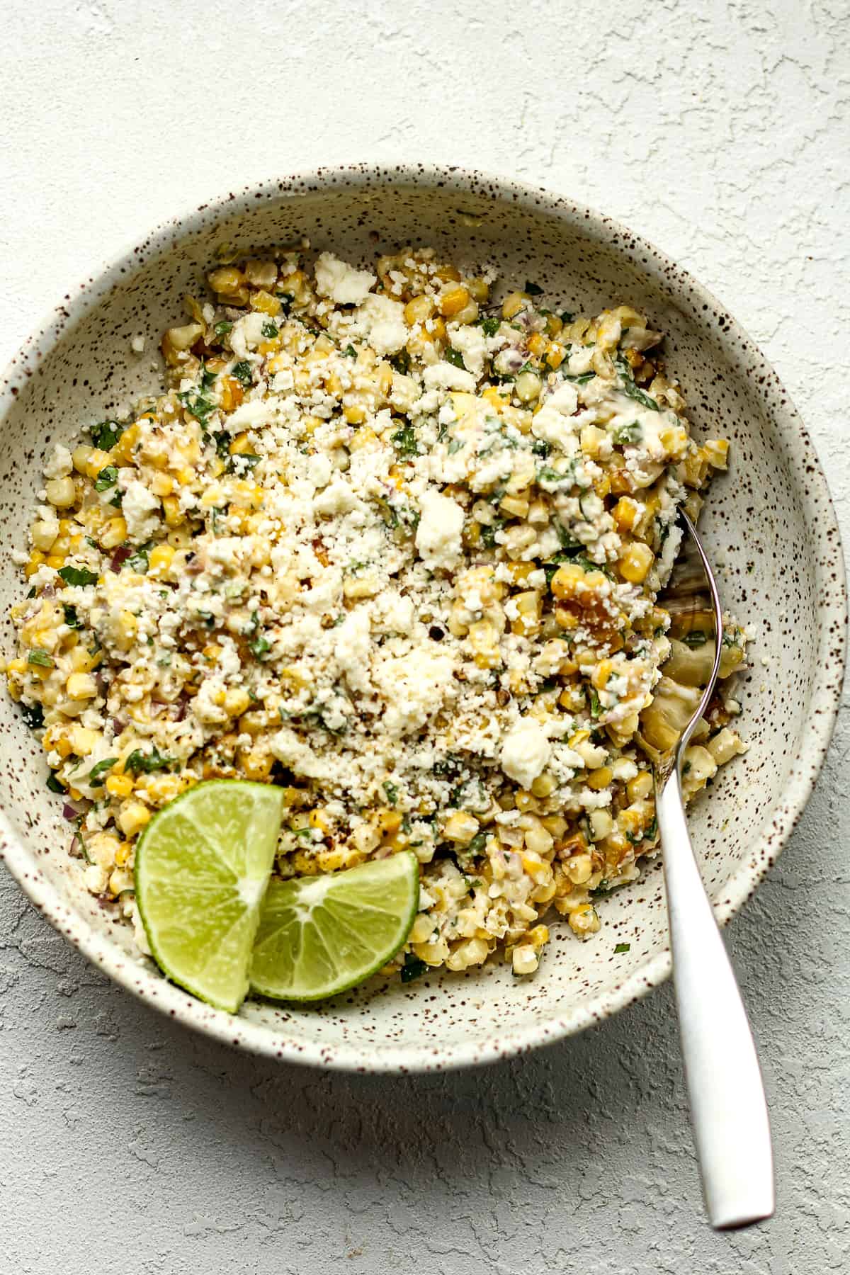 A bowl of Mexican street corn.