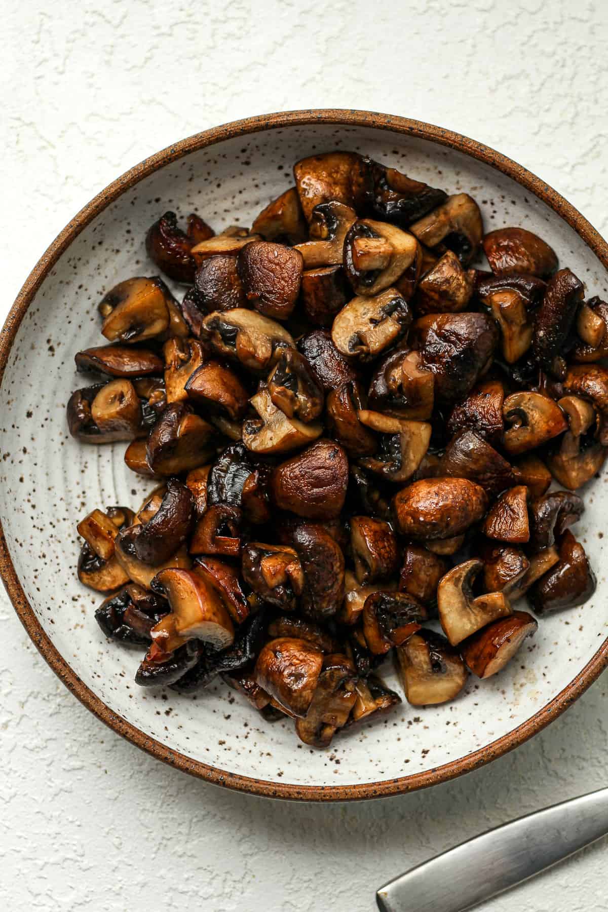 A bowl of sautéed mushrooms.