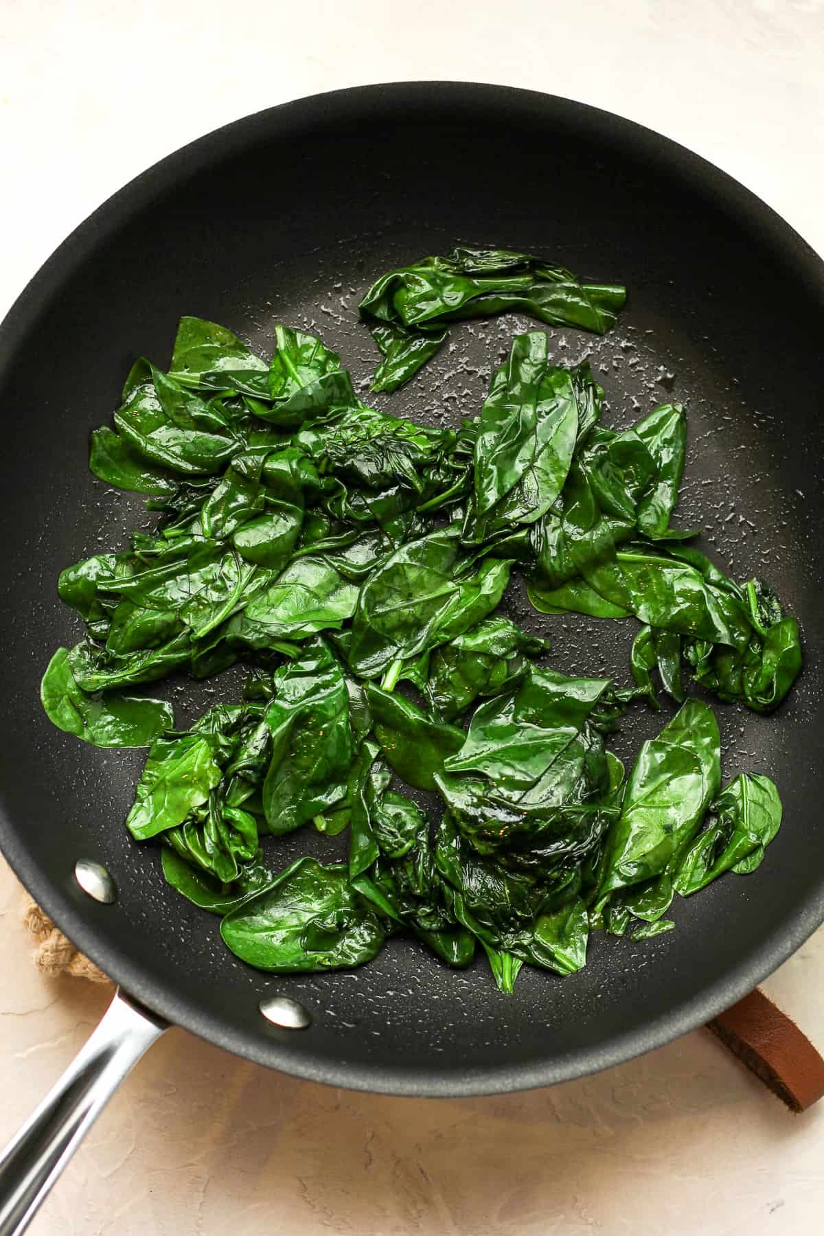 A pan of sautéed spinach.