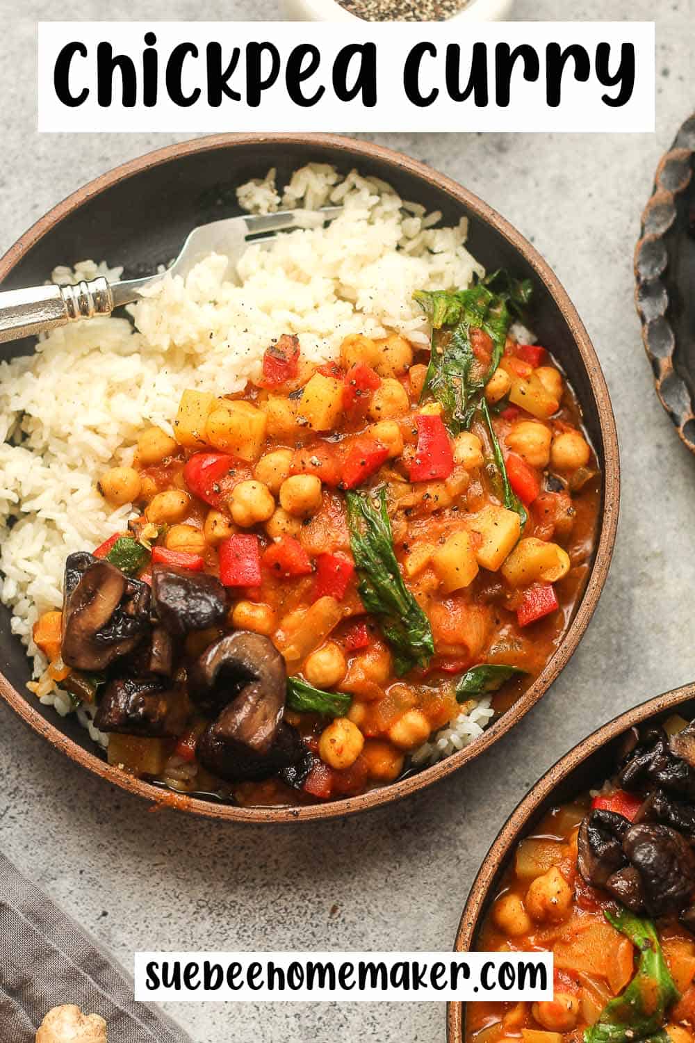 Two bowls of chickpea curry.