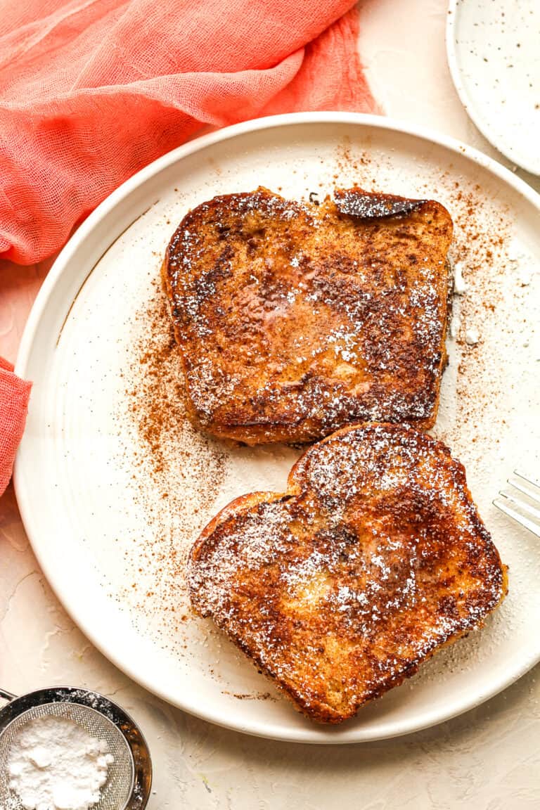 A plate of two pieces of brioche French toast.