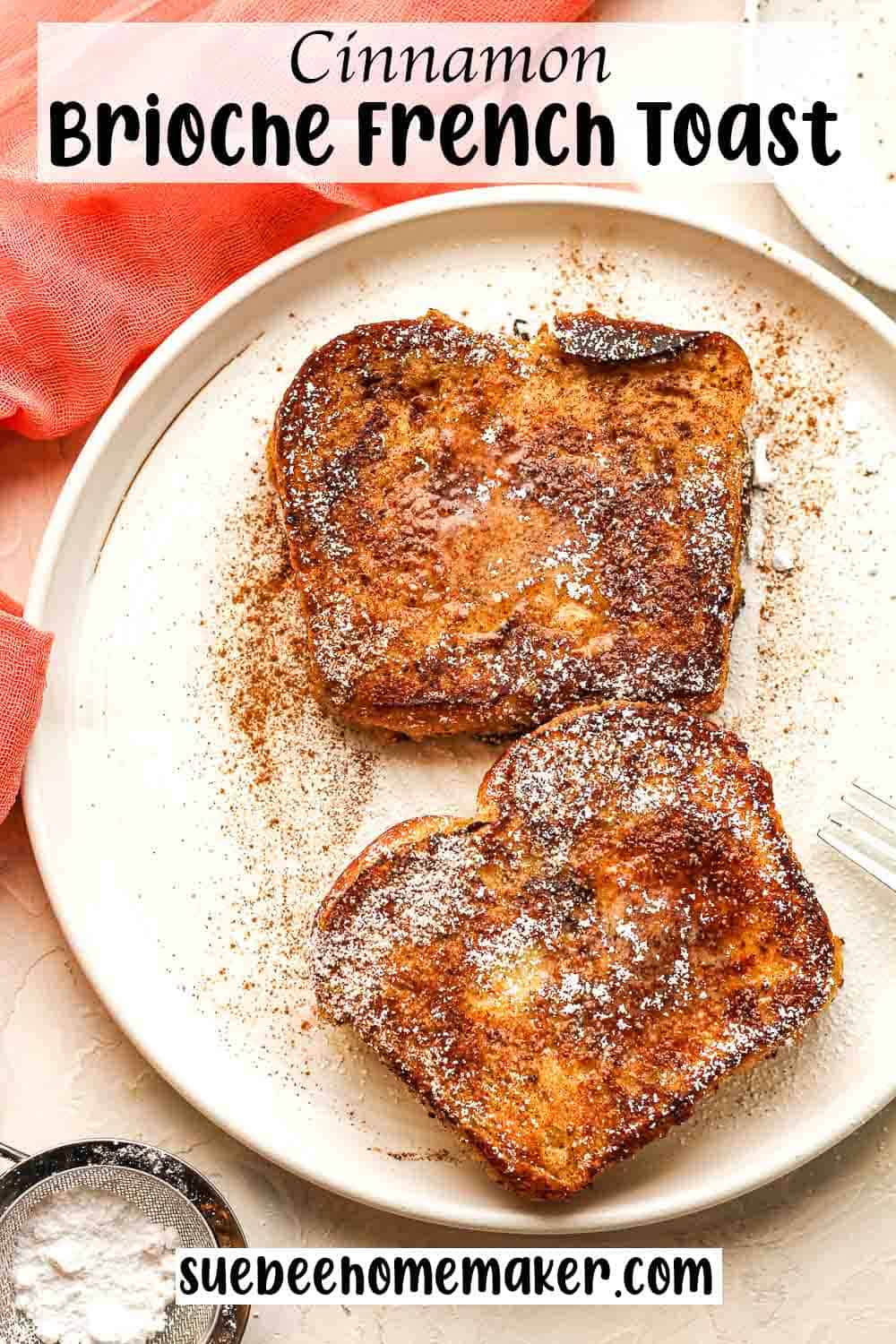A plate of two pieces of cinnamon brioche French toast.