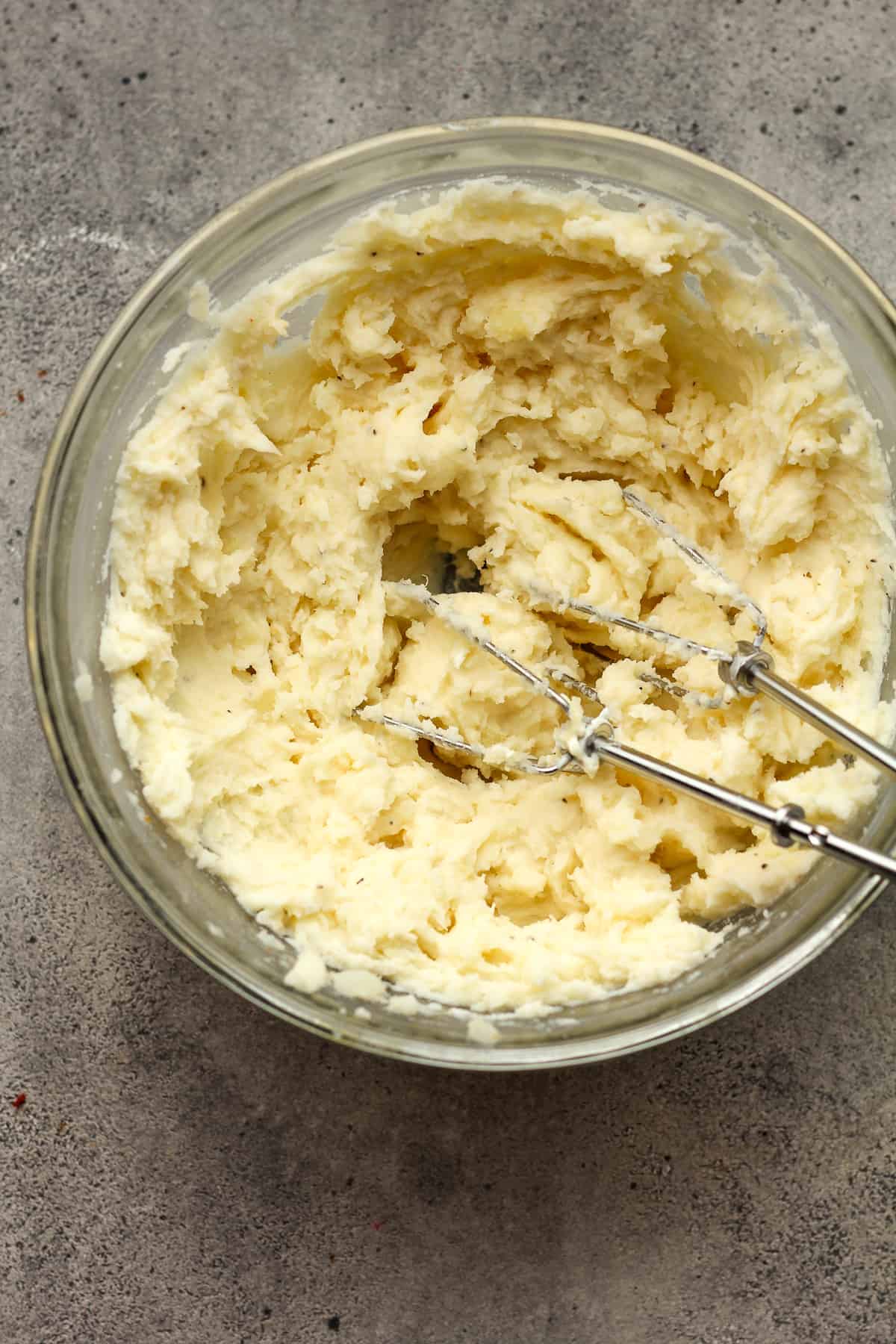 A bowl of the mashed potatoes after mixing.