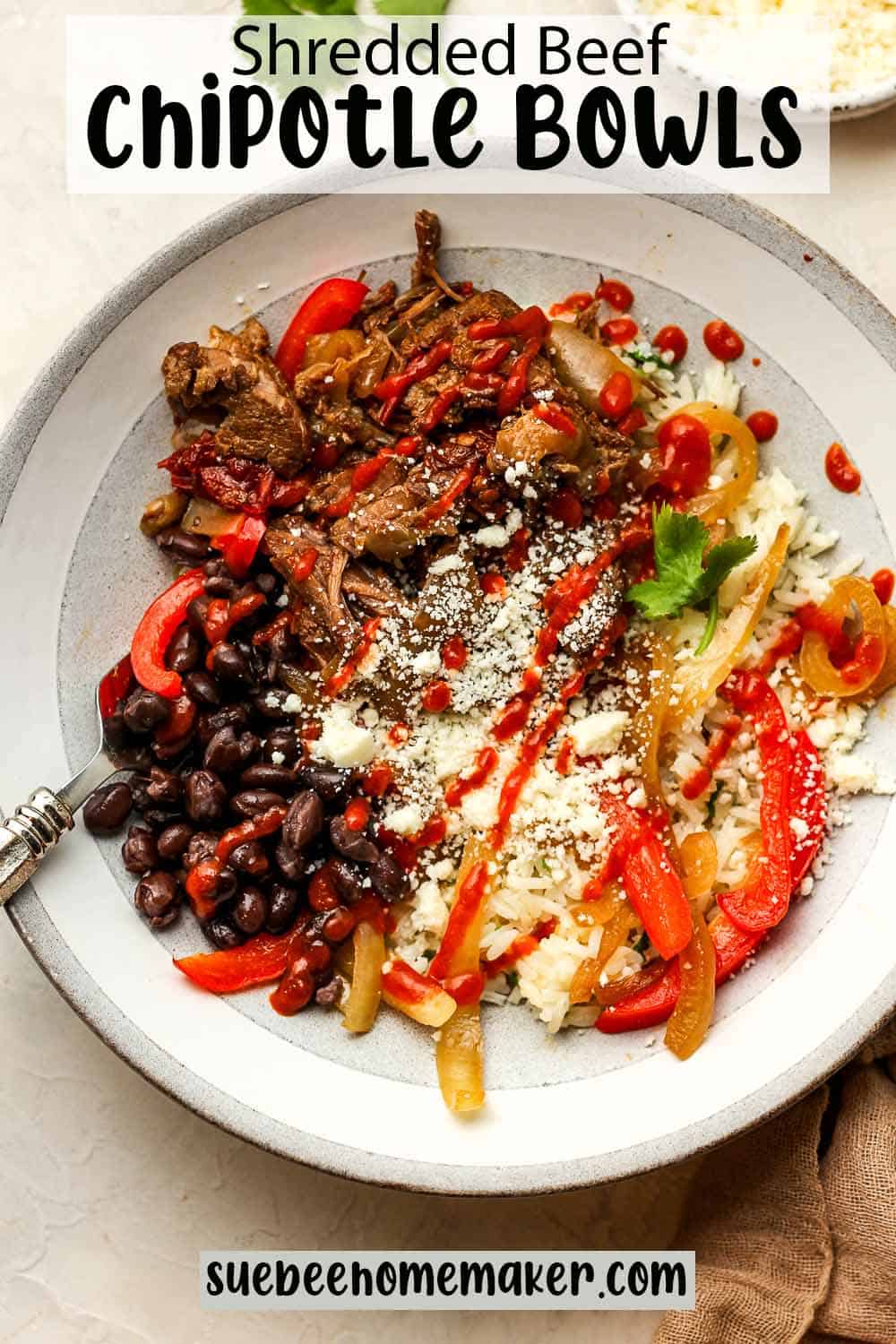 A shredded beef chipotle bowl with sriracha.