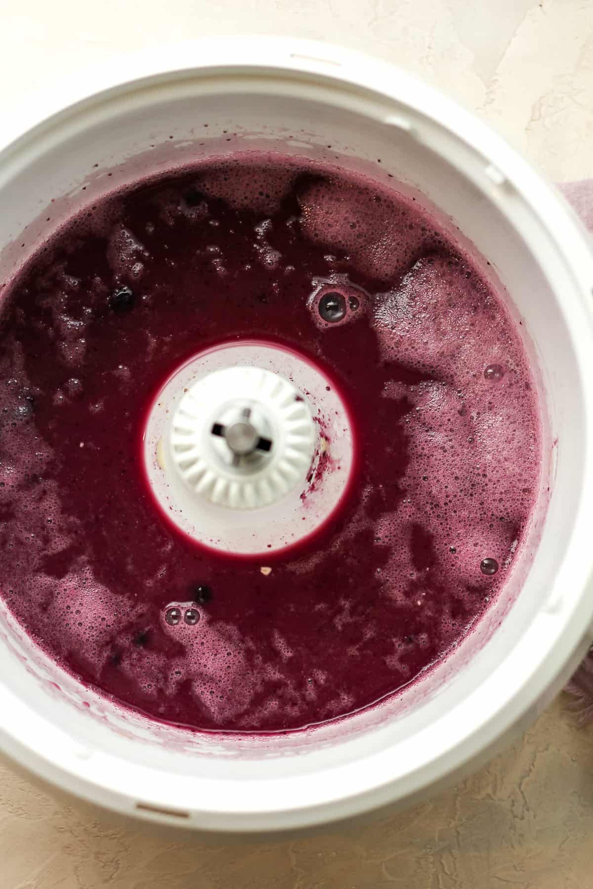 A mixer with the blueberry liquid.