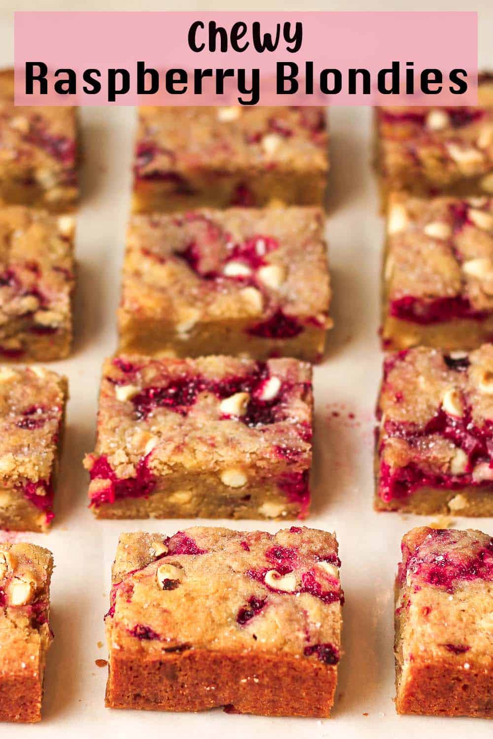 Side view of sliced chewy raspberry blondies.