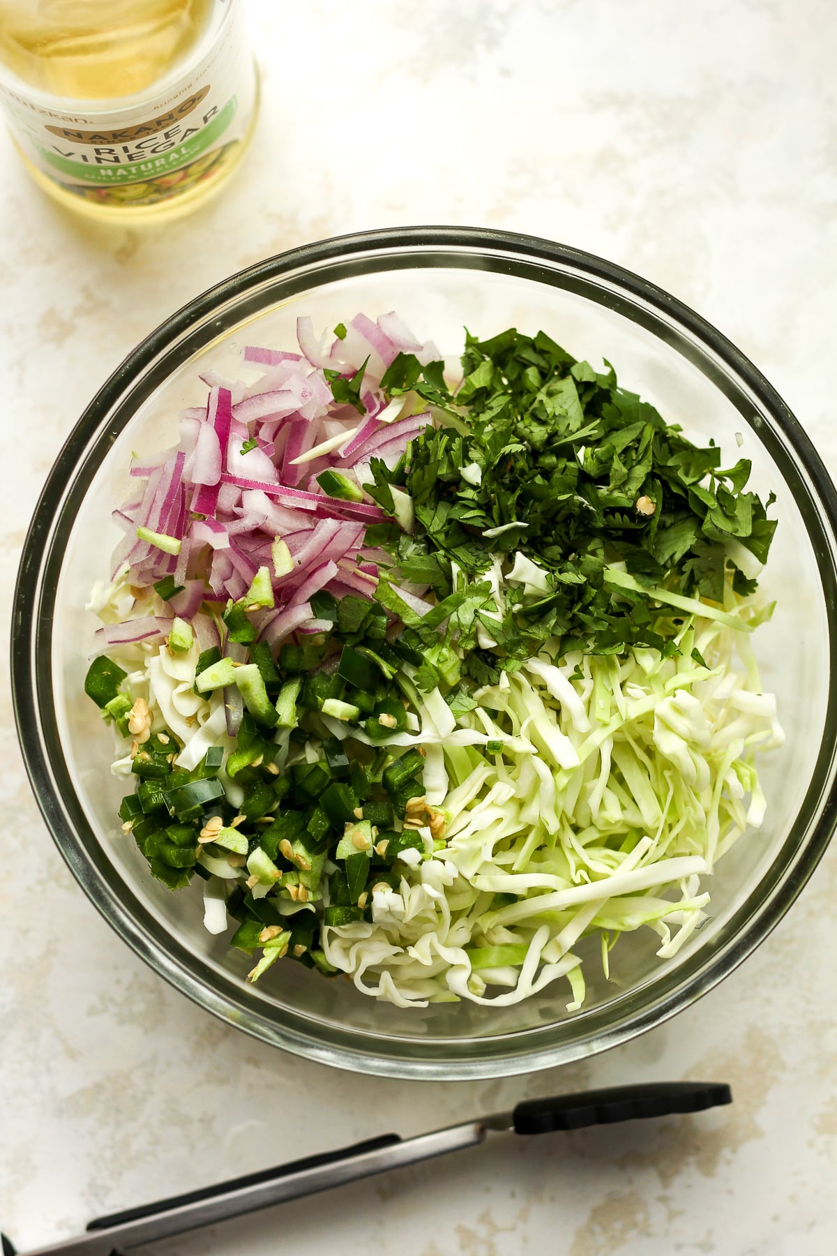A bowl of the slaw ingredients before mixing together.