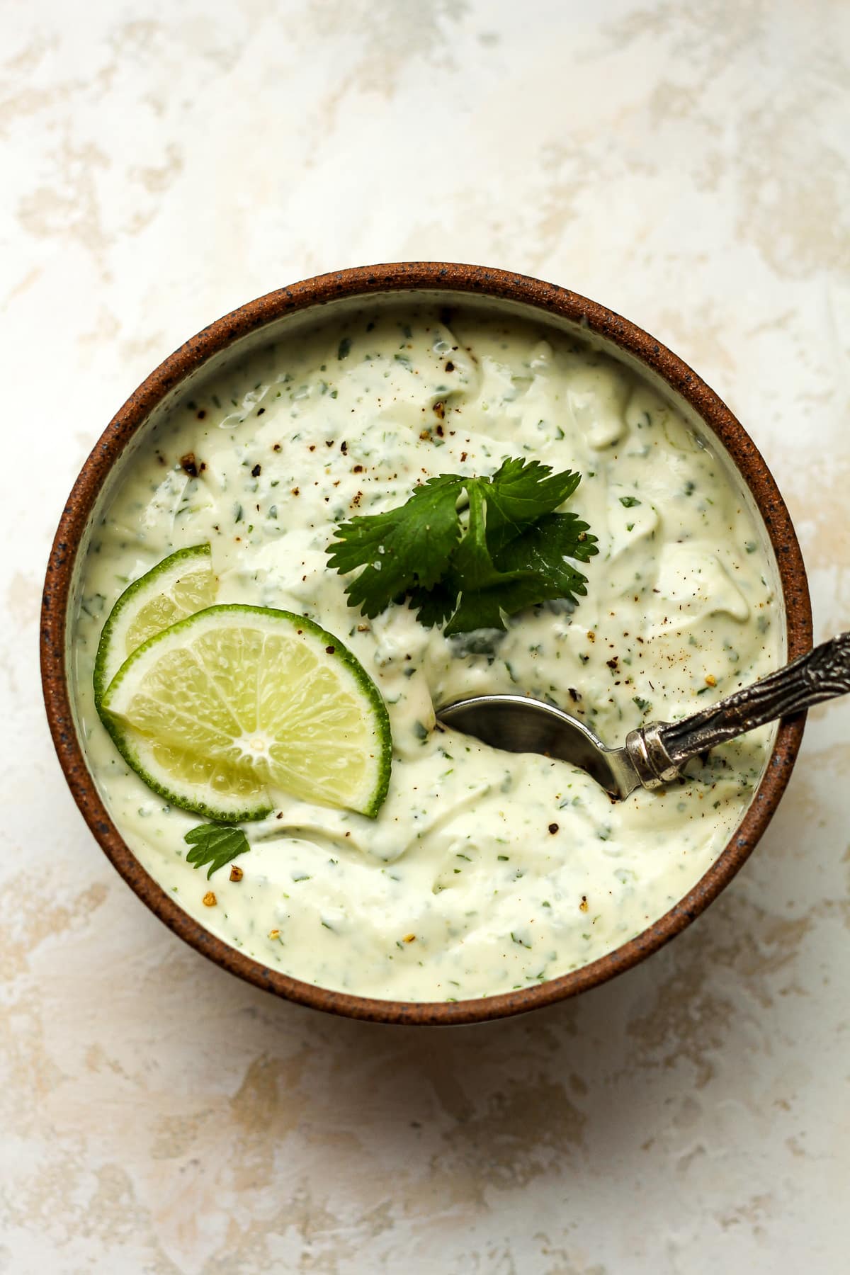 A bowl of the creamy cilantro lime dressing.