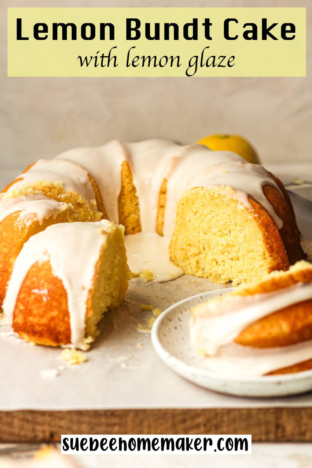 Side view of a sliced lemon bundt cake with lemon glaze.