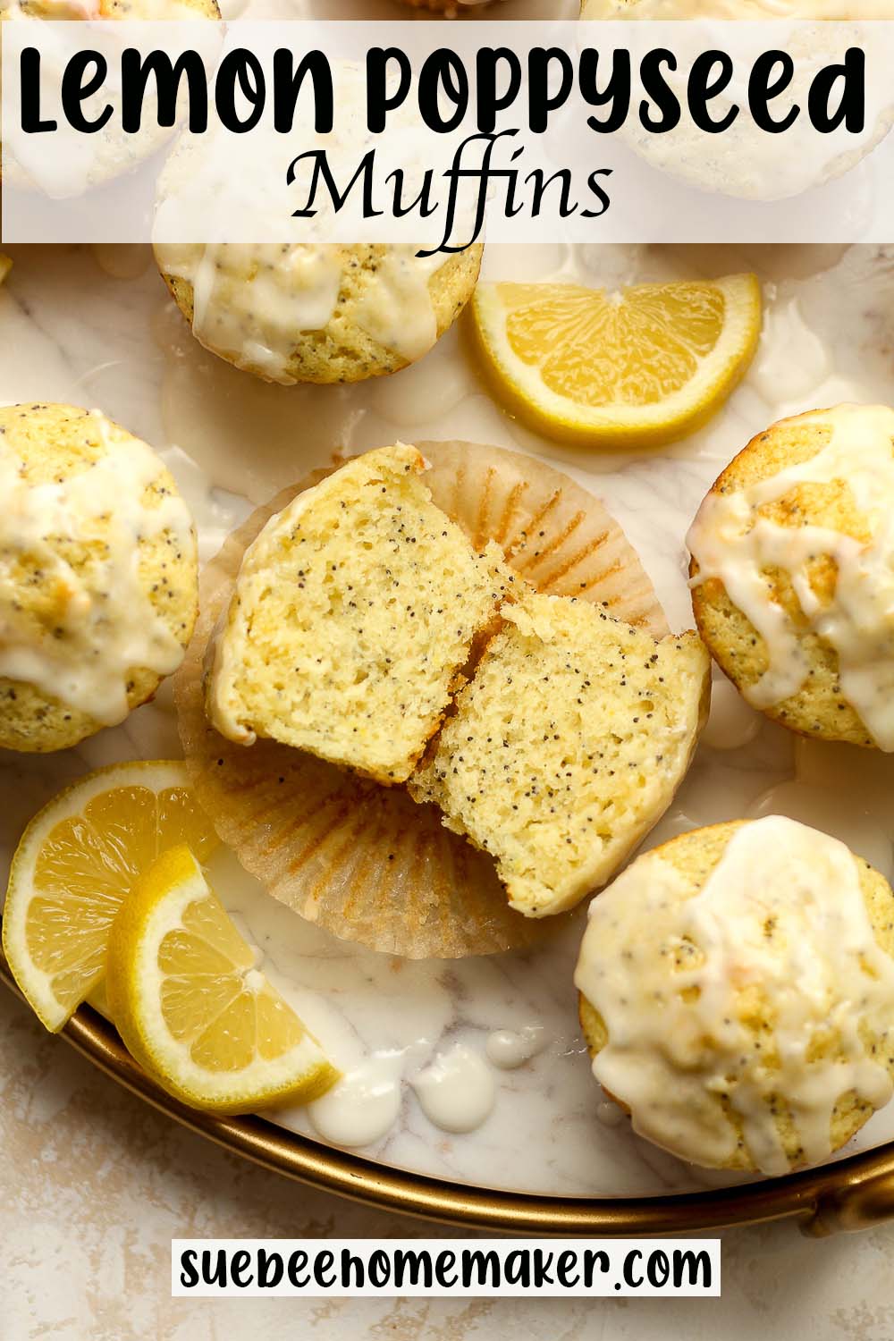 A tray of lemon poppyseed muffins with one split in half.