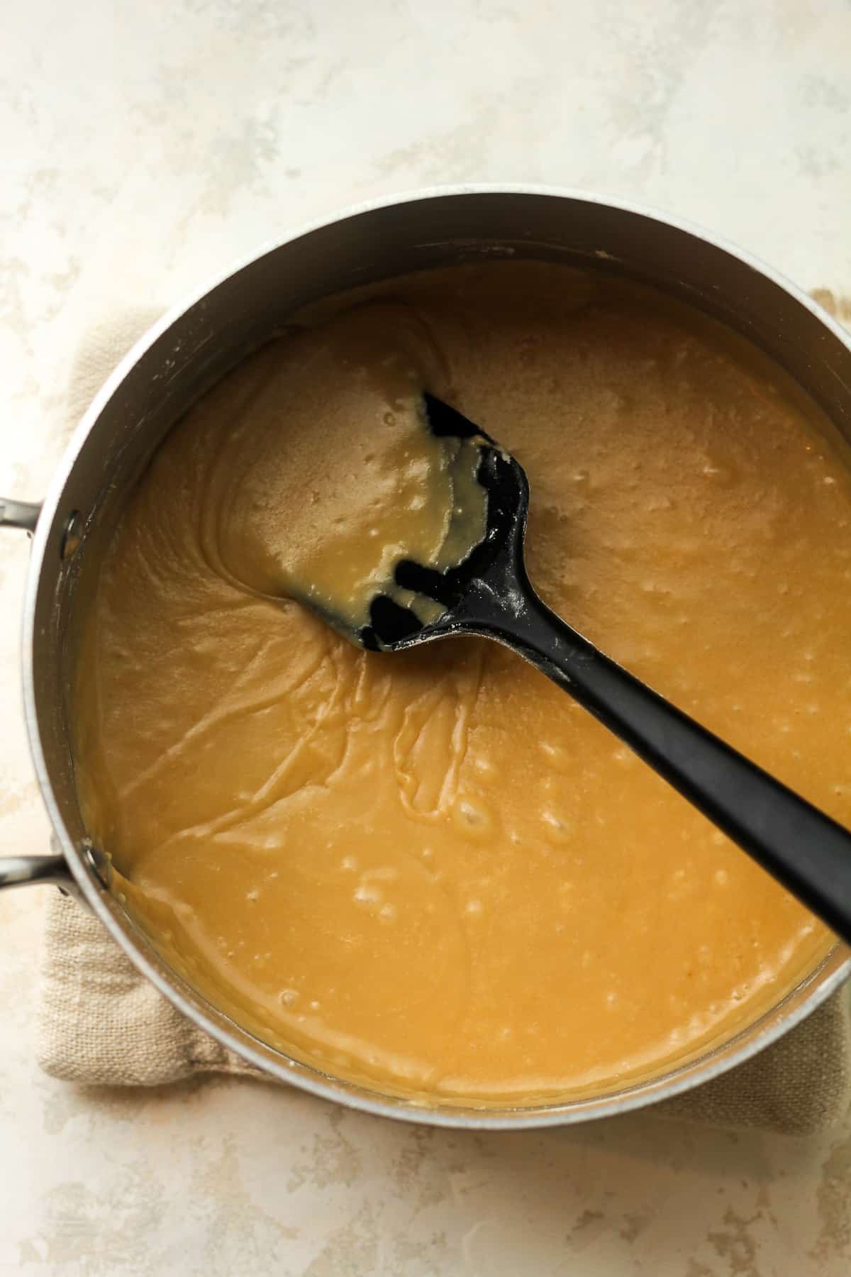 A pan of the caramel frosting.