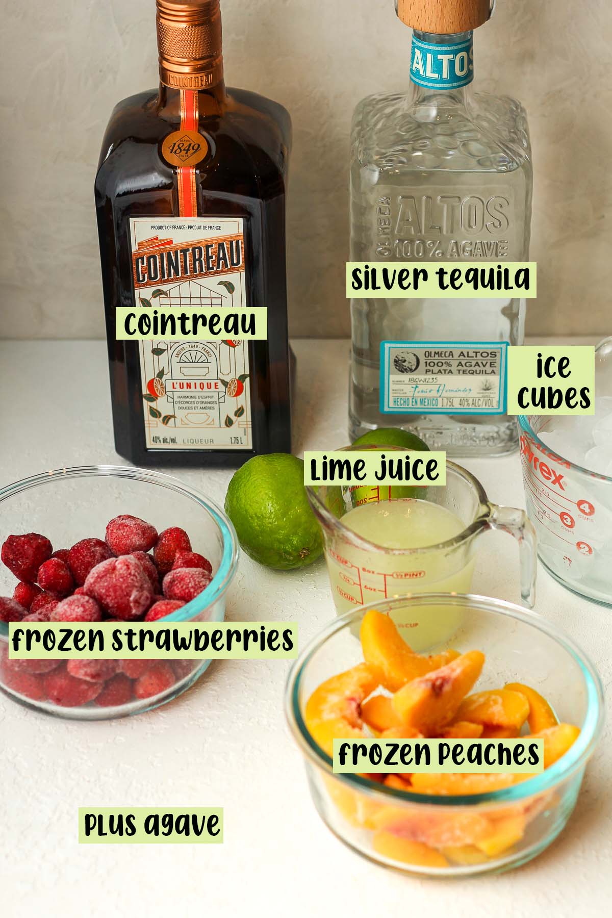 The labeled ingredients for fruity margaritas.