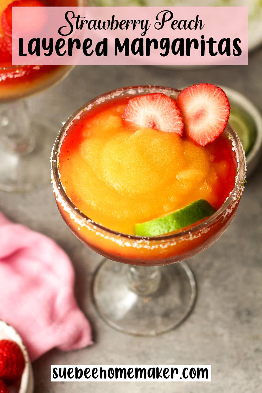 Overhead view of a large strawberry peach layered margarita.