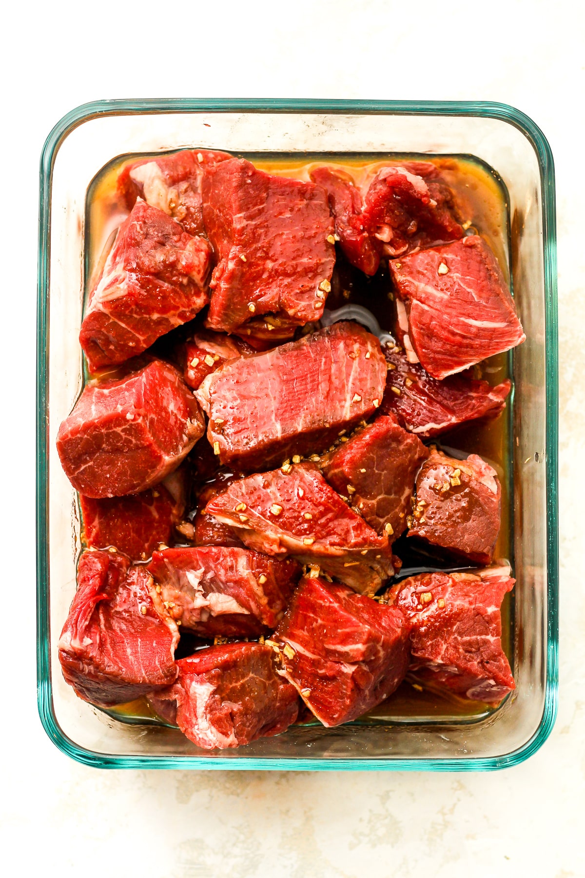 A dish of cubed steak with a tasty marinade.