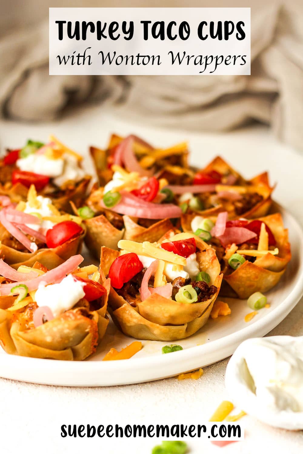 A plate of turkey taco cups with toppings.