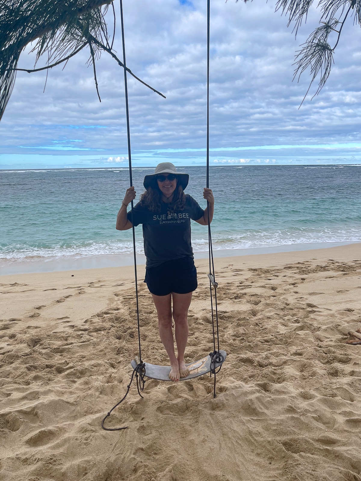 Me standing on the swing by the ocean.