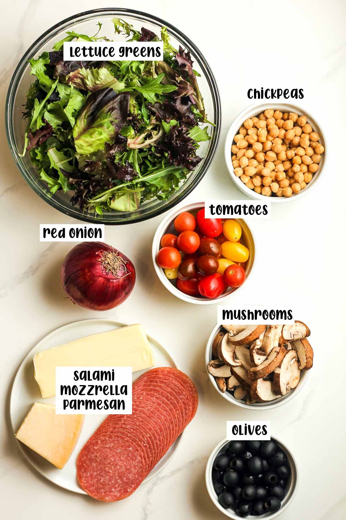 The antipasto salad ingredients, labeled.