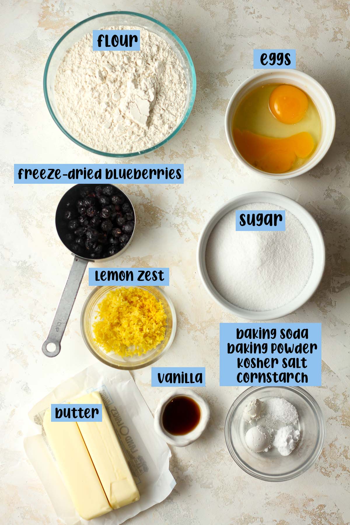The labeled ingredients for blueberry lemon cookies.