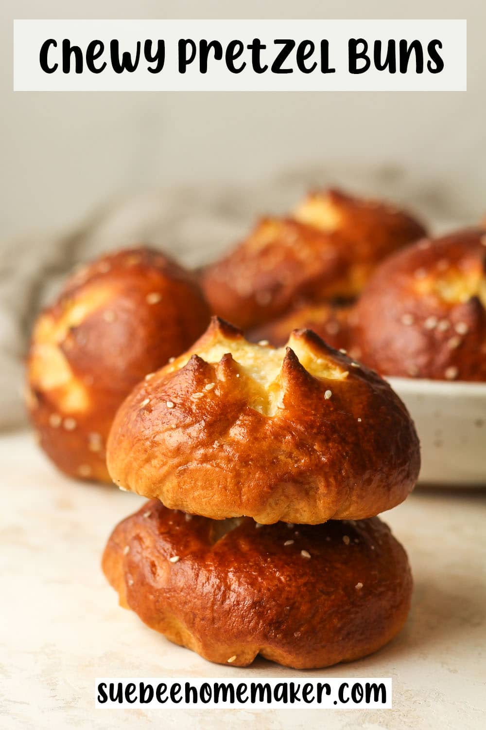 A stack of two chewy pretzel buns.